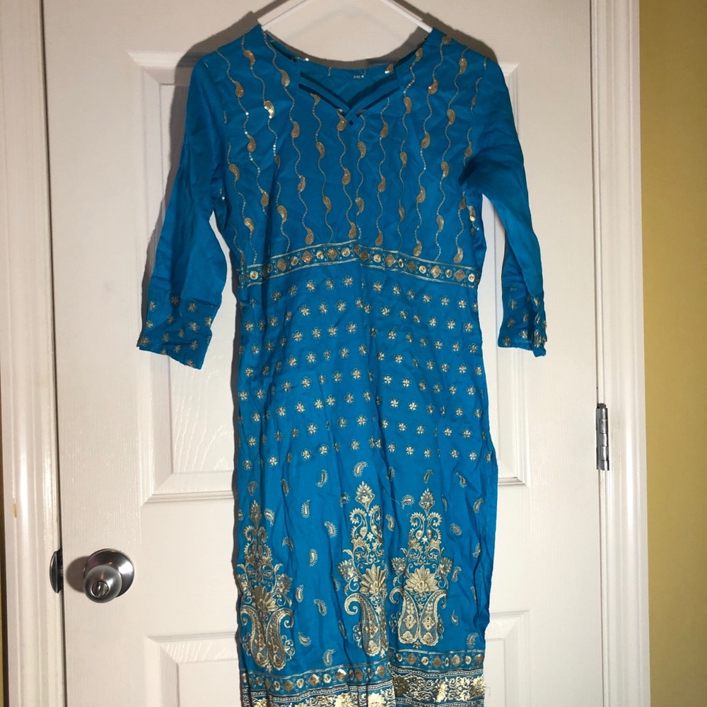 Blue shalwar kameez. Traditional desi clothes.